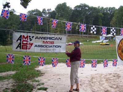 Margie Springer with AMGBA banner
