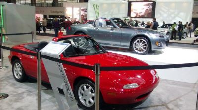 New and old Miatas at the 2011 Chicago Auto Show
