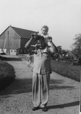 Baby Frank on farm with Dad
